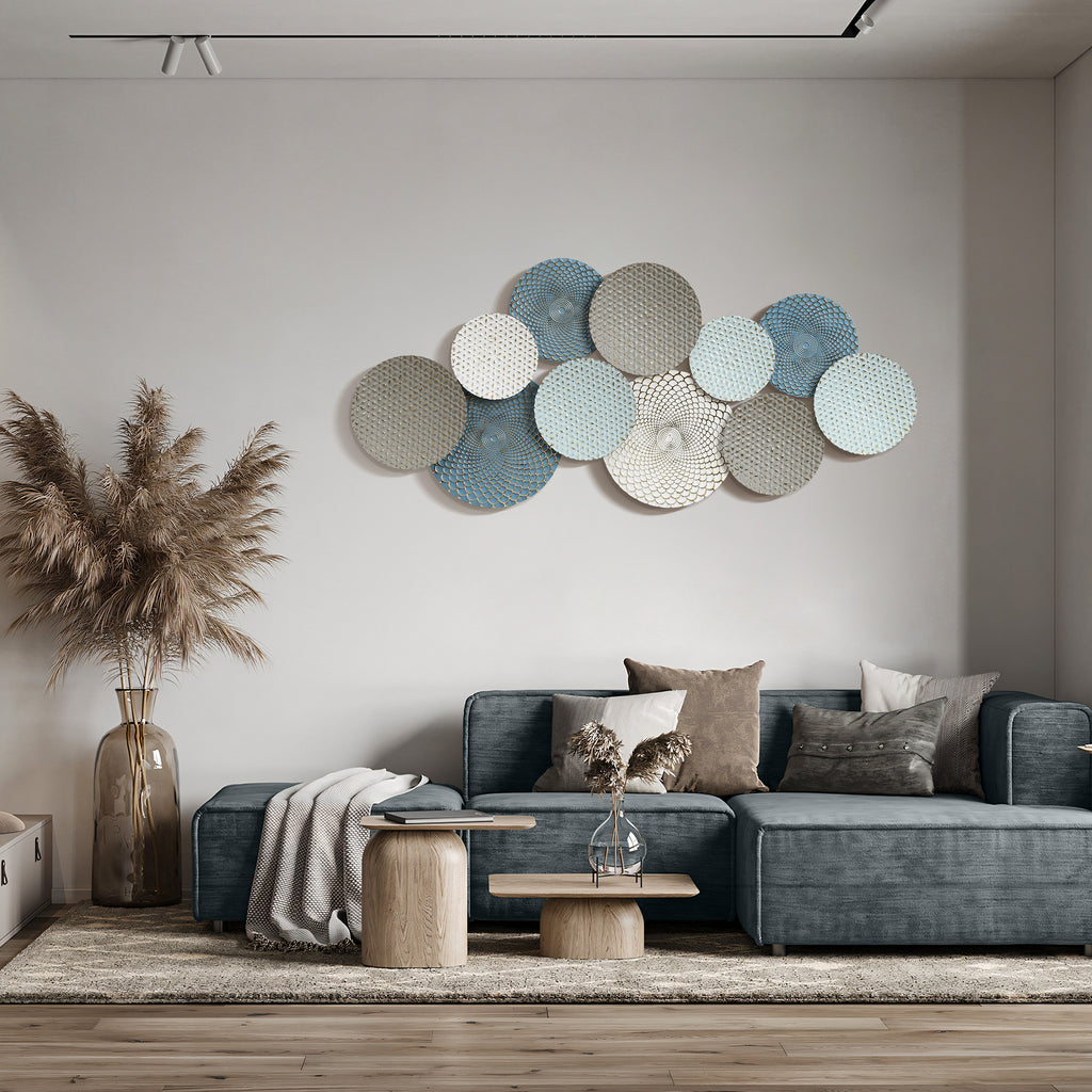 Künstlerische Wanddeko aus Metall – Kreise in sanften Pastellfarben