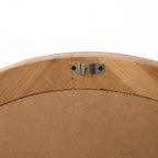 Runder Wandspiegel mit Holzrahmen