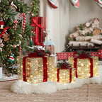 3er-Set LED-Geschenkboxen – Weihnachtsdeko in silber mit roten Schleifen und Beeren – Batteriebetrieben