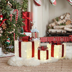 3er-Set LED-Geschenkboxen – Weihnachtsdeko in Weiß mit roten Schleifen