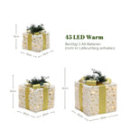 3er-Set LED-Geschenkboxen – Weihnachtsdeko mit Schneeflocken- und Tannenmuster, verziert mit goldenen Schleifen, Zweigen & silbernen Beeren